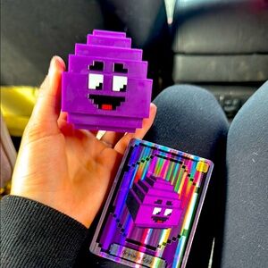 Purple Pixelated Character Toy and Card
